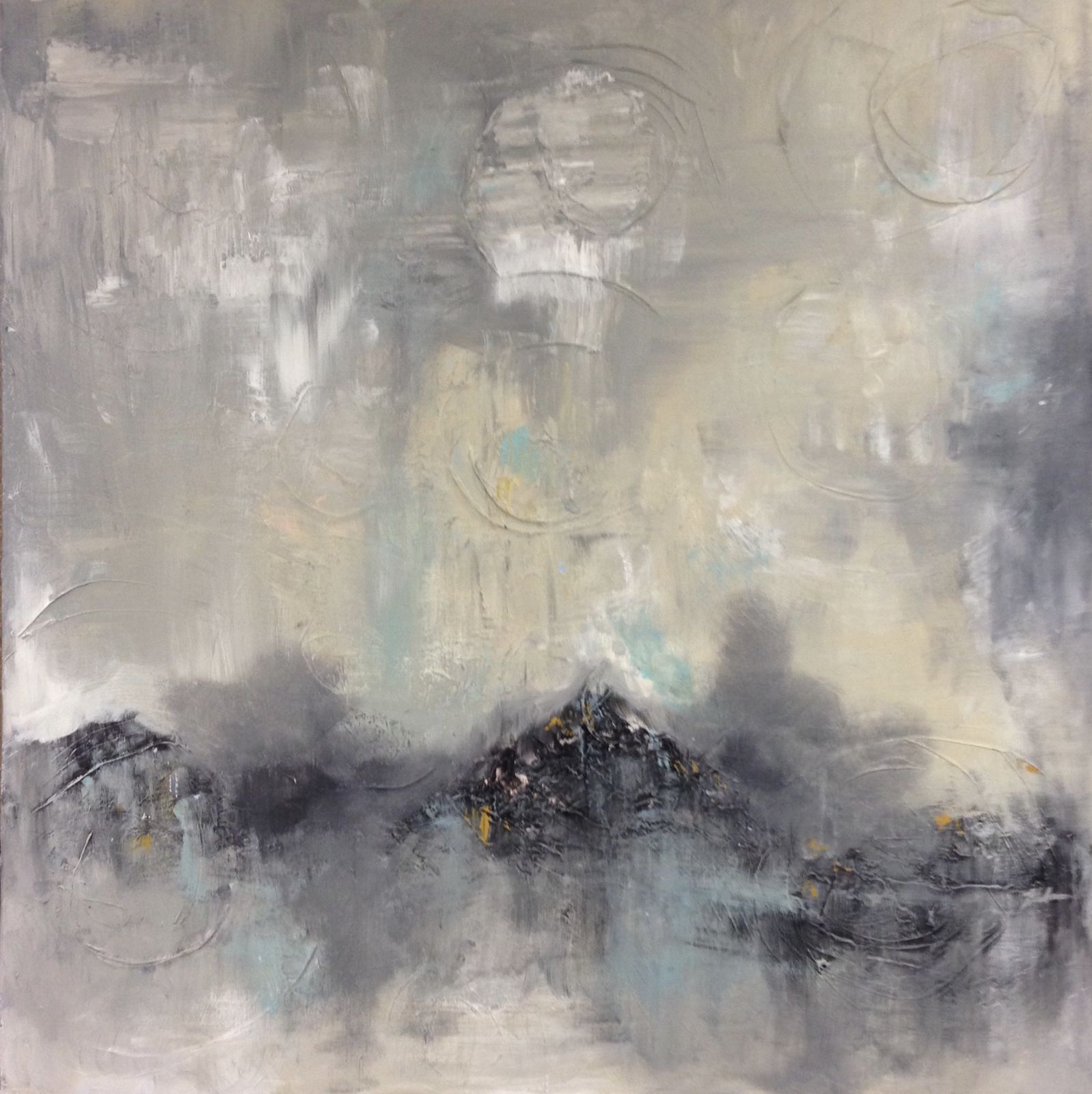 Non-objective painting in smoky grays and cream with faint circular marks and a band of dark, textured shapes along the bottom